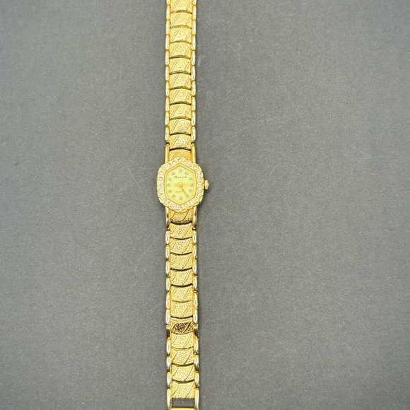 Ronica gold tone ladies watch with rhinestone accents. - Picture 3 of 5